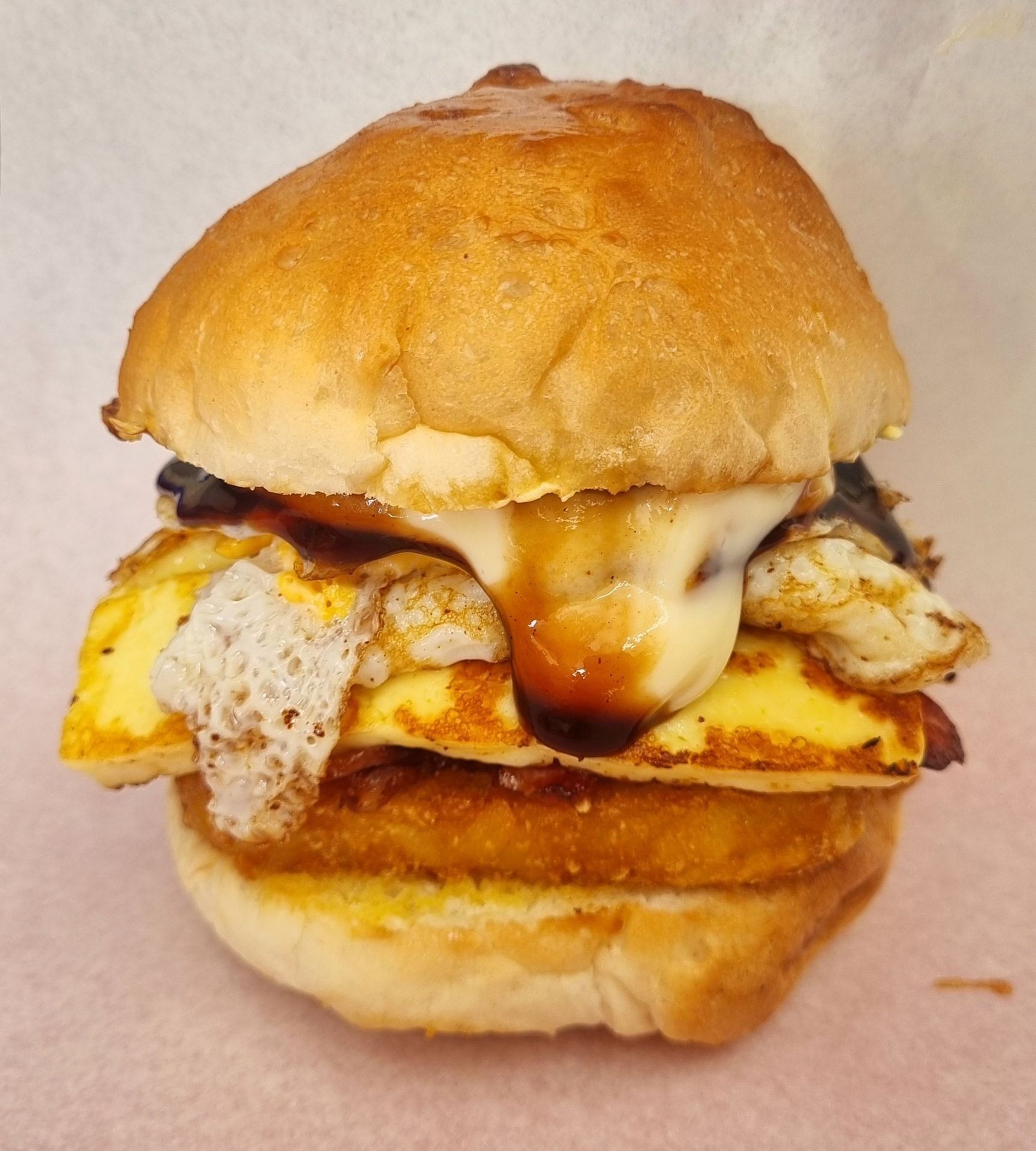 Halloumi, egg and hash brown roll